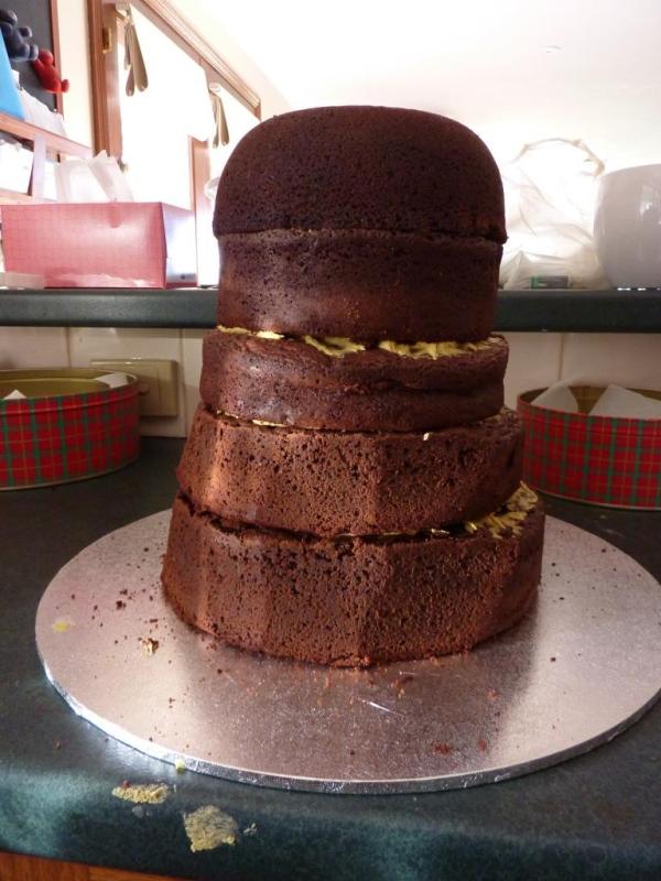 Stacked, glued and trimmed. (I love using mudcake - it cuts beautifully with a bread knife.)