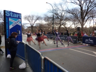 Highland dancers and a pipe band.